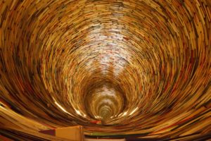 Image of a tunnel made of books